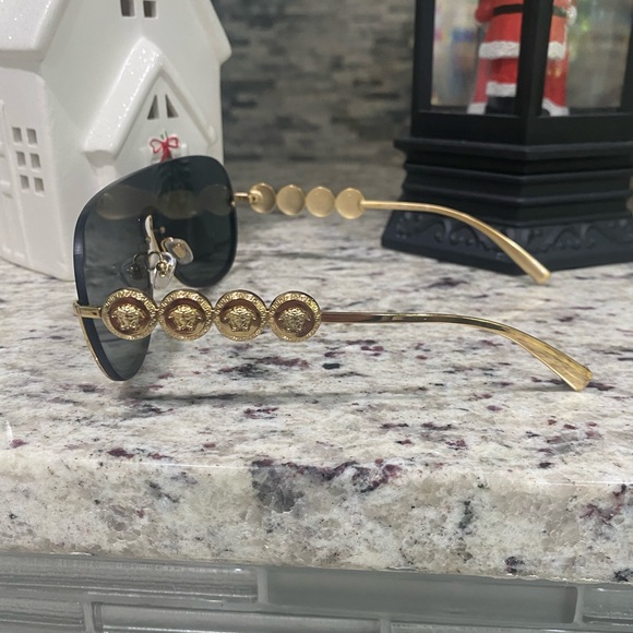 Versace woman’s sunglasses- never worn